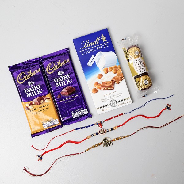 Auspicious Rakhis And Chocolates Combo