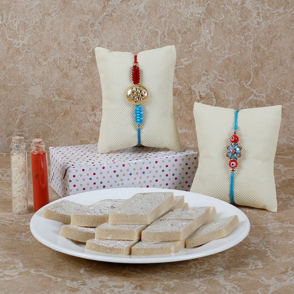 Blue Designer Rakhis And Kaju Katli Combo