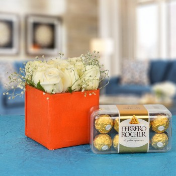9 White Roses In A Special Orange Vase with 16 pcs Ferrero Rocher