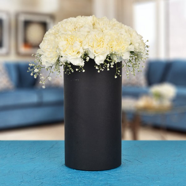 20 White Carnations In A Black Cylindrical Vase