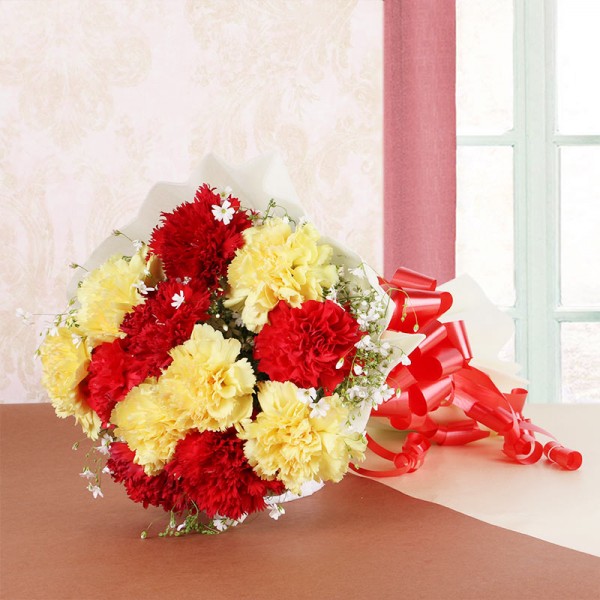 12 Red and Yellow Carnations in White Paper