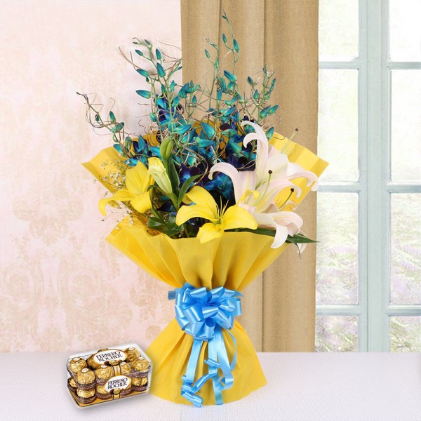 4 Blue Orchids and 4 Yellow and White Asiatic Lilies in Yellow Paper and Blue Bow with 16 pcs Ferrero Rocher