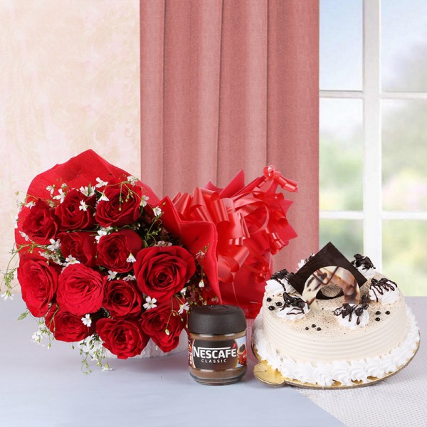 12 Red Roses in Red Paper with Nescafe Coffee (25gms) and Half Kg Coffee Cake