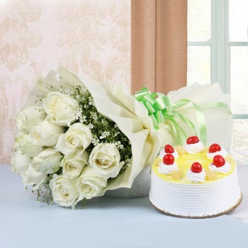 12 White Roses in White Paper with Pineapple Cake (Half Kg)