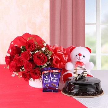 10 Red Roses in Red Paper Packing with 2 Dairy Milk Chocolate (13.2 gm), Half Kg Chocolate Truffle Cake and Teddy Bear (6inch)