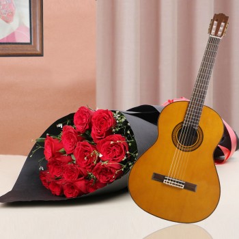 12 red roses in Paper Packing with Live song by guitarist