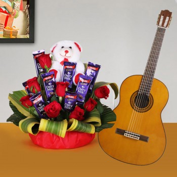 8 red roses with 8 Dairy Milk chocolates (13.2 gram) and One teddy bear (6 inches) with Live song by guitarist