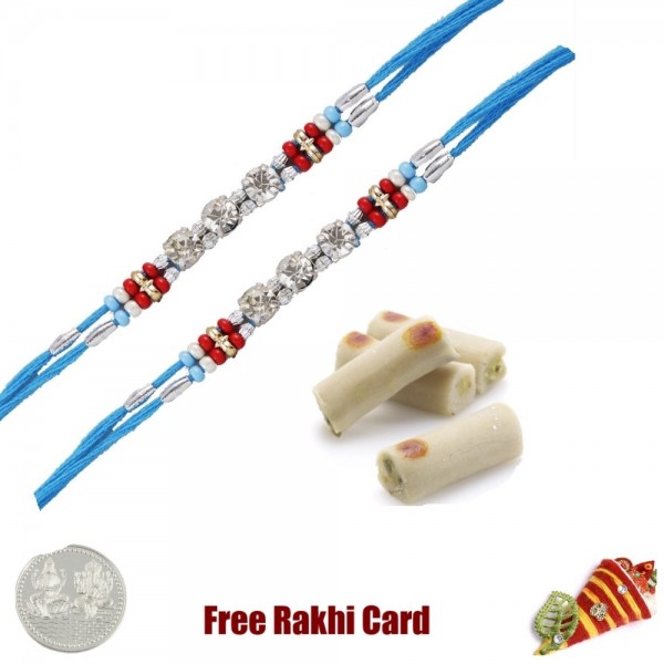 2 Rakhis with 450 grams Assorted Kaju Rolls Free Silver Coin