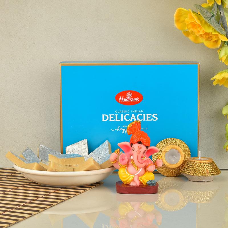 Kaju Katli with Ganesha Idol and Matki Diya