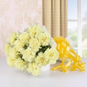 15 Yellow Carnations in White Paper Packing