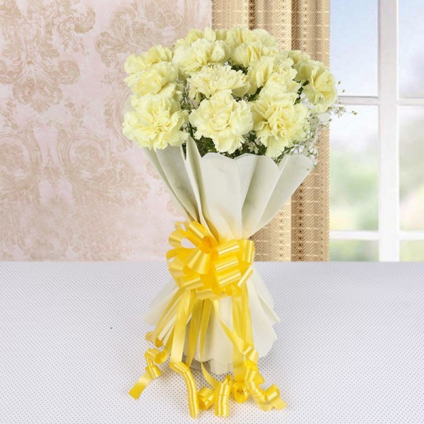 15 Yellow Carnations in White Paper Packing