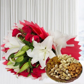 A bunch of Flowers (12 Red Roses, 3 White Asiatic Lily) in Red and White Paper Packing, White Paper Bow with Assorted Dry Fruits (250gms)