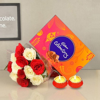 12 Red and White Roses in Cellophane Packing with Cadbury's Celebrations (131.3 gms) and Set of 2 Diya