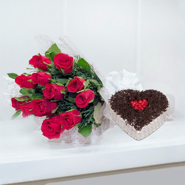 12 Red Roses in Cellophane Packing with 1 Kg Heart-shaped Black Forest Cake