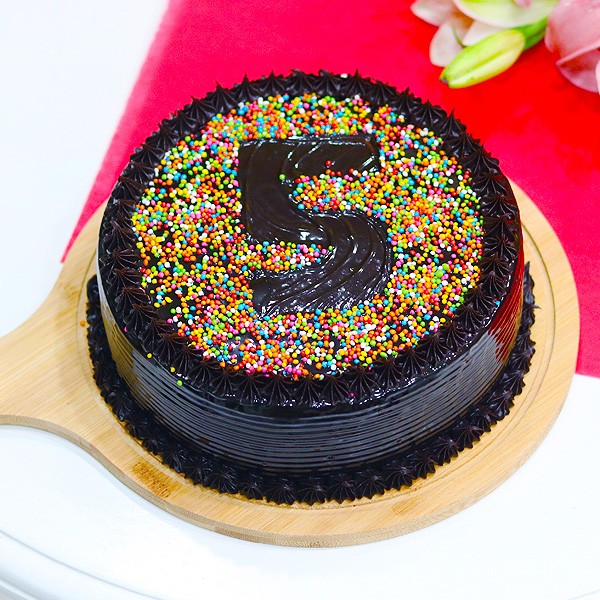 Half Kg Designer Round Shape Chocolate Cake with 5 number on it
