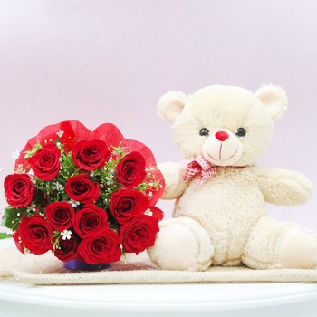 12 Red Roses in Red Paper Packing with Teddy Bear 12 inches