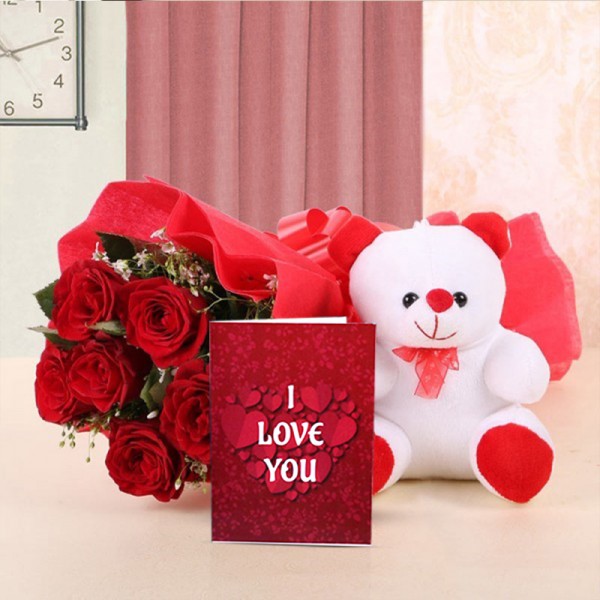 6 Red Roses wrapped in a Red paper and a Red bow with 1 Teddy Bear (6 Inches) and Greeting Card Valentines Day