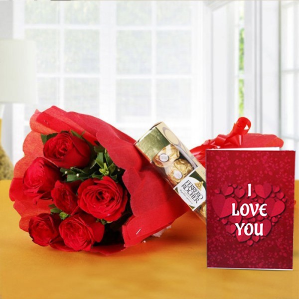 6 Red Roses with 4 Ferrero Rocher Chocolates in Red Paper Packing with Valentines Day Greeting Card 