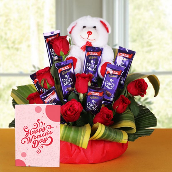 8 Red Roses with 8 Cadbury's DairyMilk Chocolates (14gms each) and Teddy Bear (6 inches) and Womens Day Greeting Card in a Basket