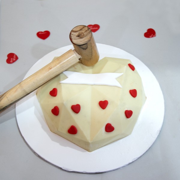 Pinata Cake With Hammer | bakehoney.com