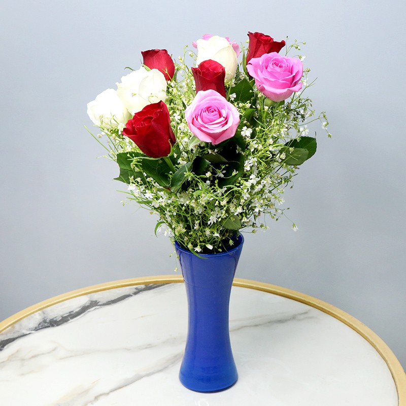 8 Red Roses and 3 White Asiatic Lilies in a Glass Vase