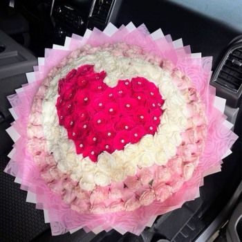 A Heart-shaped arrangement of 75 Red Roses and 25 Pink Roses