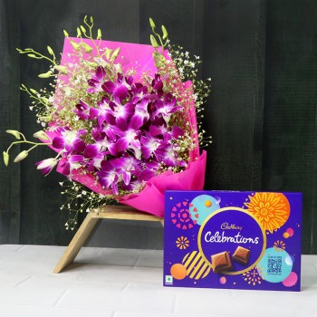 6 Purple Orchids with Cadbury's Celebration pack (131.3 gm) and Paper Packing
