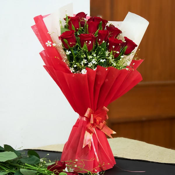 12 Red Roses wrapped in cellophane