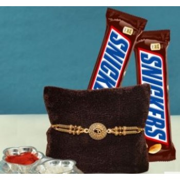 Designer Golden Om Rakhi With Two Snickers Chocolates