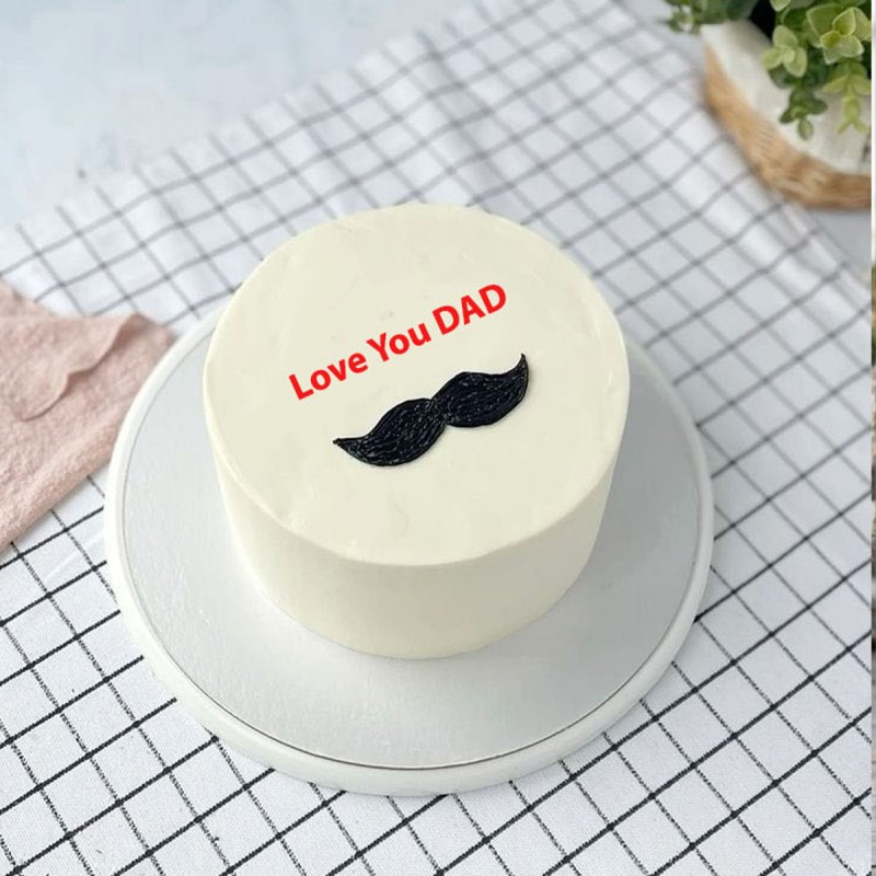 Half Kg Butterscotch Cake with " DAD" written on it