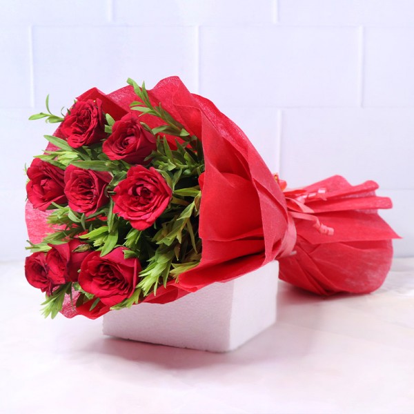  8 Red Roses in Paper Packing