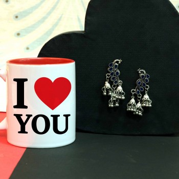 One black Mens Wallet with Heart Shape Pendant and a jar full of almonds