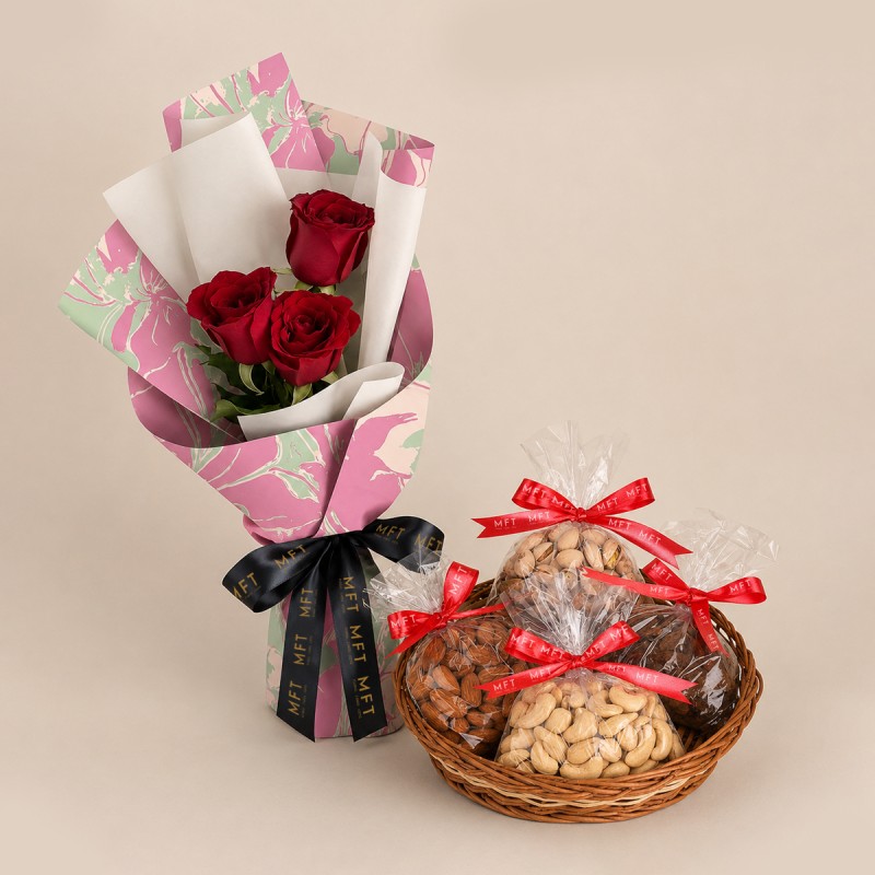 A Cane Basket containing Almonds (200 gms), Cashew Nuts (200 gms), Raisins (200 gms) and Pistachios (200 gms)
