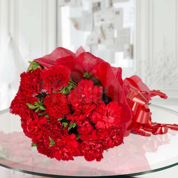 12 Red Carnations wrapped in red special paper
