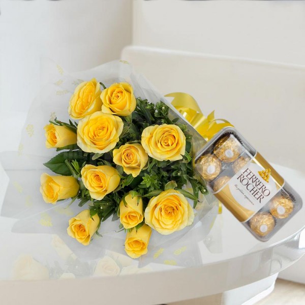 12 Yellow Roses wrapped in cellophane with 16 Pcs Ferrero Rocher