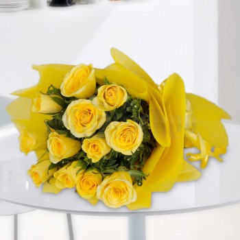  12 Yellow Roses wrapped in yellow special paper