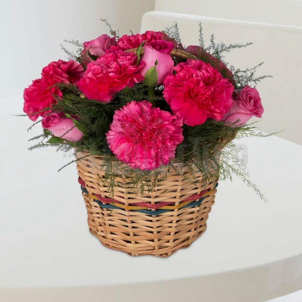 6 Pink Carnations with 6 Pink Roses arranged in a Basket