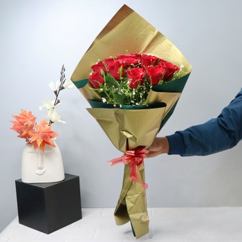 12 Red Roses wrapped in Golden Paper
