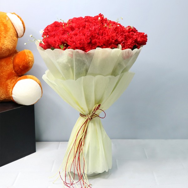 20 Red Carnations wrapped in White Special Paper