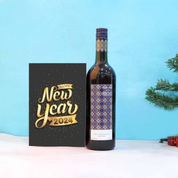 Bottle of Red Wine and New Year Greeting Card