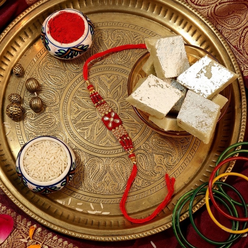 Gliterring Red Kundan Rakhi With Delicacy