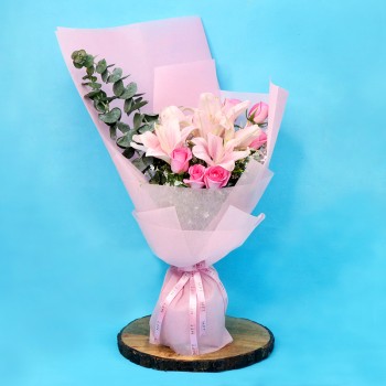 15 Hot Pink Roses with 8 Oriental Pink Lilies in Paper Packing