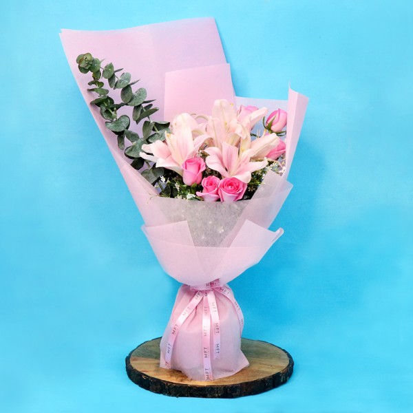 15 Hot Pink Roses with 8 Oriental Pink Lilies in Paper Packing