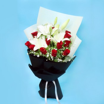 12 Red Roses and 3 White Asiatic Lilies wrapped in Red and White special paper