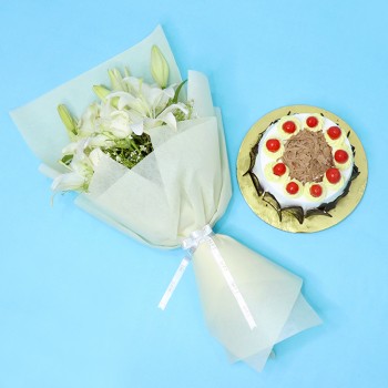 4 White Asiatic Lilies and 15 Red Roses in Red paper, White paper bow with Back Forest Cake (Half Kg)